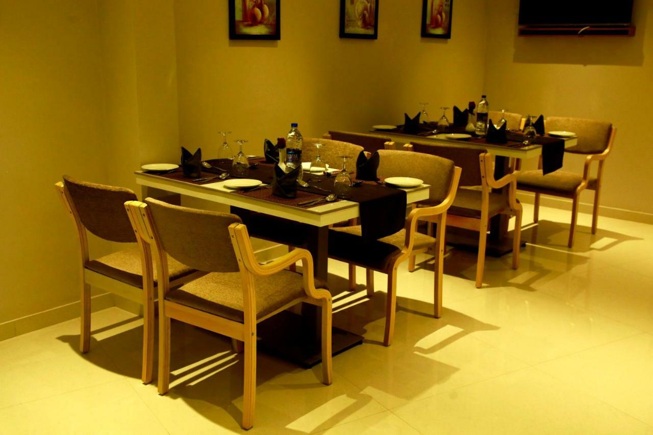 Hotel Panacea Ventures Kollam Extérieur photo